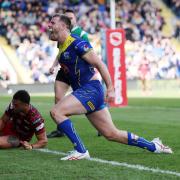 Lachlan Fitzgibbon celebrates his try against Leigh