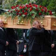 The coffin of Lord Hoyle on Friday