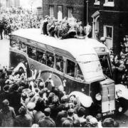 Warrington parade the silverware in Sankey Street after winning the league and cup double in 1954