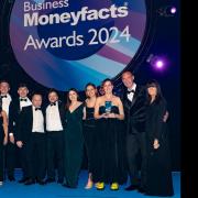 Redwood's representatives at the Business Moneyfacts Awards 2024 with Claudia Winkleman
