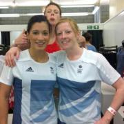 Holly Lam-Moores, left, and handball teammates have some fun while getting kitted out in GB attire after Olympic Games selection