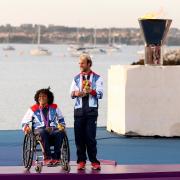 Niki Birrell picks up his medal in Weymouth with Alexandra Rickham