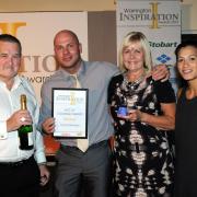 Accepting the award are husband Chris, mum Siv Brown, handball player Holly Lam-Moores and Keith Thompson, from Raddon Court