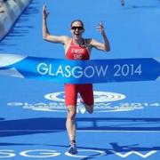 Jodie Stimpson crosses the line to win gold. Picture courtesy of Press Association.