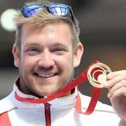 Dan Greaves struck gold in the men's discus F42/F44 competition at Hampden Park. Pictures courtesy of Press Association