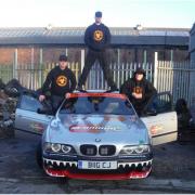 The Dukes of Biohazard, aka Chris Johnson, Craig Daniels and Mark Ryder with their BMW