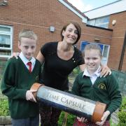 Pupils Alfie Hands and Kathryn Kendrick with head teacher Michelle Dobson MBA080615A
