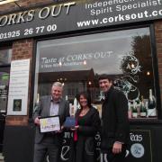Dave McNicholl and Andy Gatcliffe present award to Corks Out