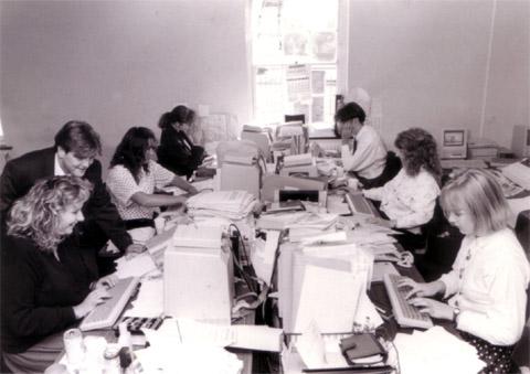 The Warrington Guardian newsdesk in the early 1990s. Then a reporter, now editor Nicola Priest, is on the left. Standing by her is Greg Nixon who is now a journalism lecturer and far right, is  Helen Carter, a former reporter on the national Guardian.