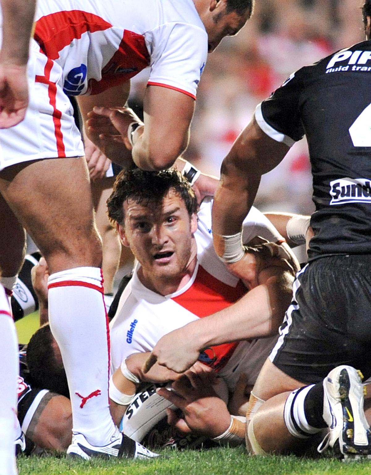 Martin Gleeson, tackled by New Zealand in the 2008 World Cup