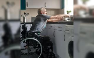 Alan Walker, who had his right leg amputated, says that he has been left waiting three years for an adapted kitchen to be fitted