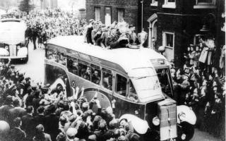 Warrington parade the silverware in Sankey Street after winning the league and cup double in 1954
