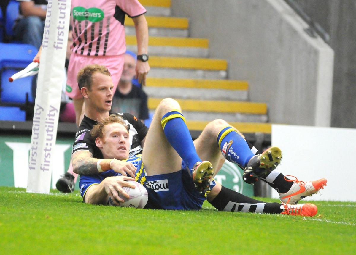 Brown joined Widnes ahead of the 2013 season. Here he is trying in vain to stop Joel Monaghan touching down.