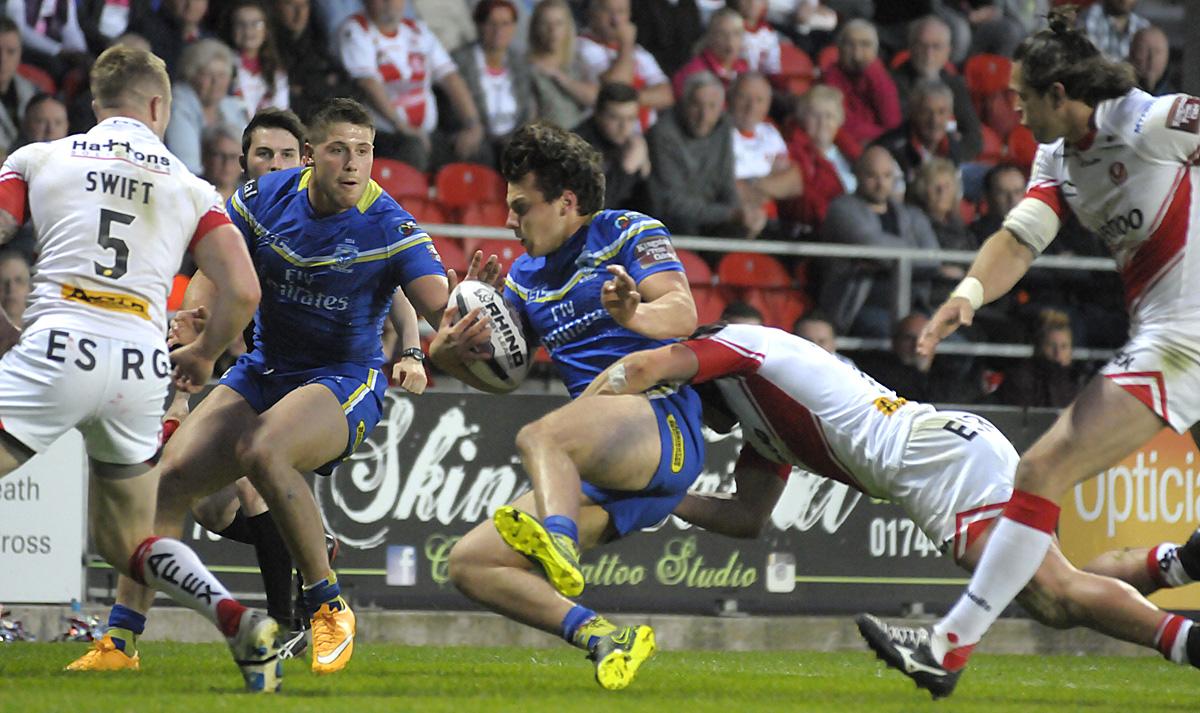 Action from The Wire's Super League Round 17 clash at Langtree Park. Pictures by Mike Boden