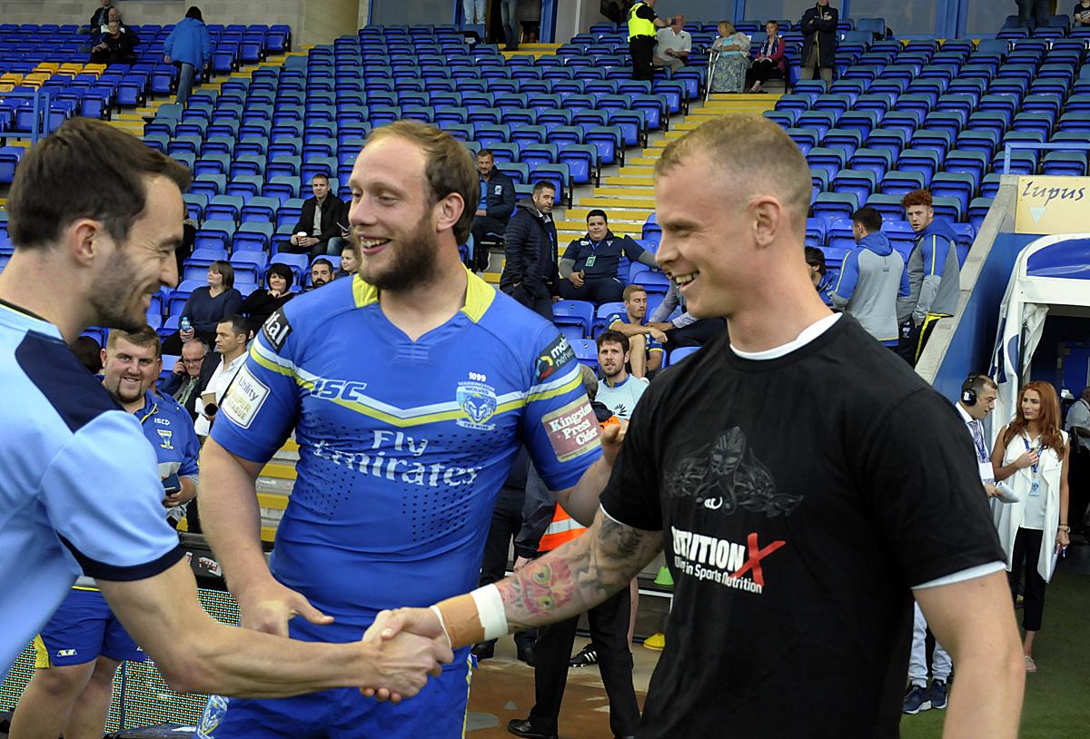 Chris Hill watches on as Brown shakes hands with referee James Child ahead of the 2016 Challenge Cup quarter final