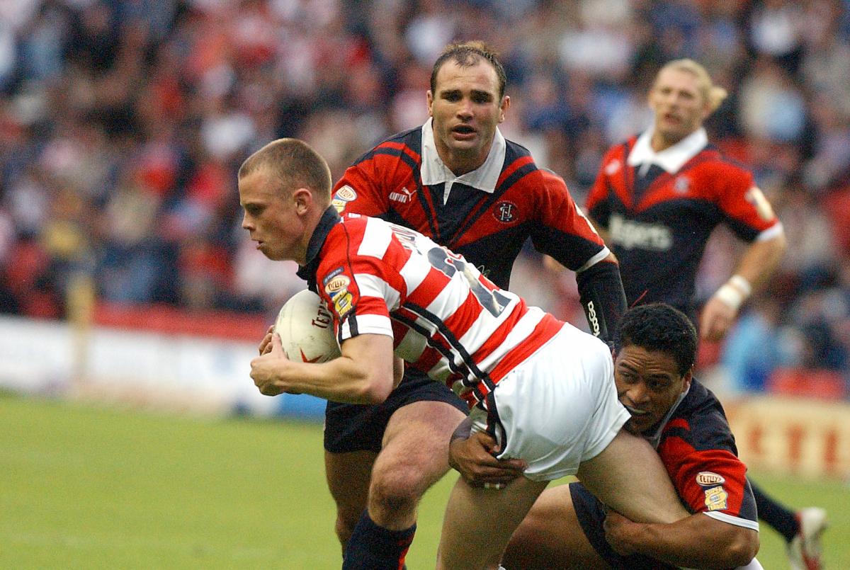 Brown started his career at Wigan. Here he is in action for the Warriors against St Helens in 2004