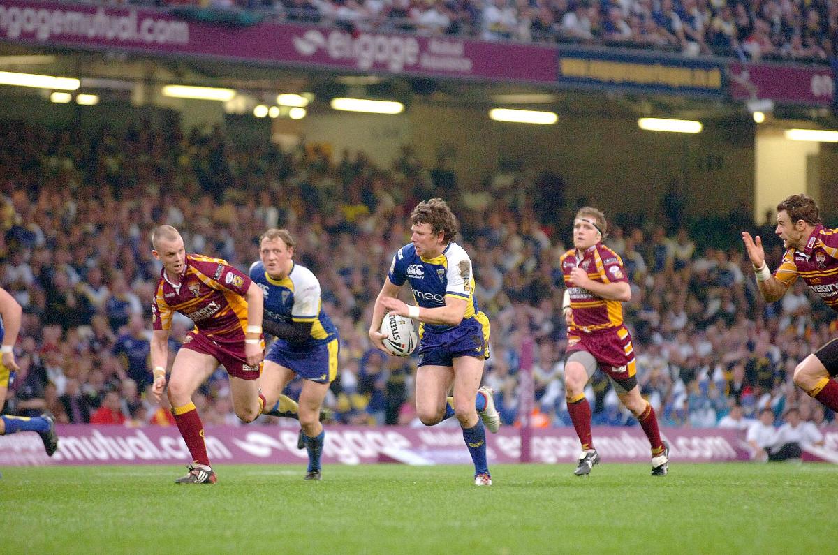 After an initial loan period, Brown moved to Huddersfield permanently in 2007. Here he is chasing Lee Briers at the 2008 Milleniun Magic event
