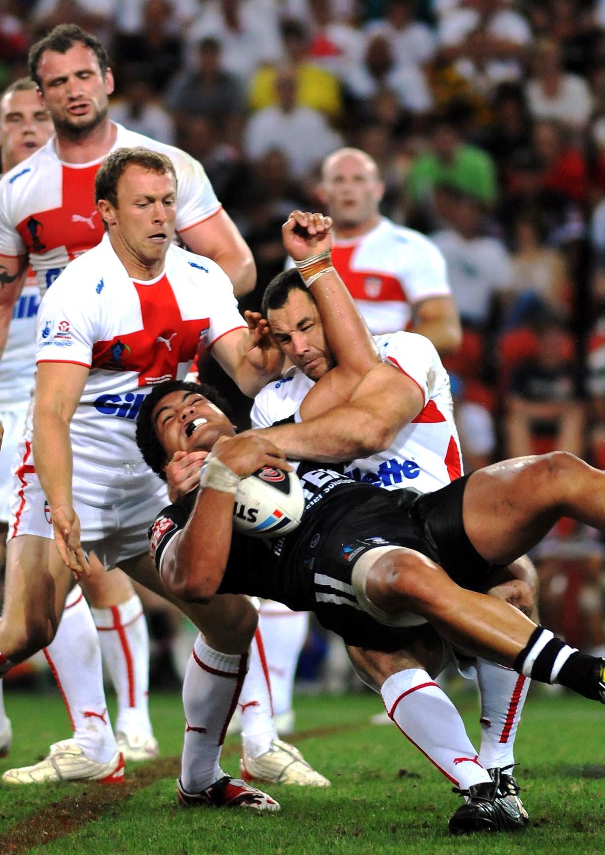 Wolves' Adrian Morley and Micky Higham get to grips with New Zealand's Adam Blair in the 2008 World Cup