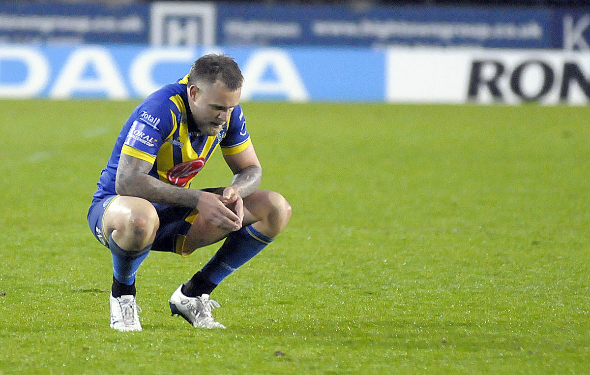 Blake Austin cuts a despondent figure after last years loss to Salford Red Devils. Picture by Mike Boden