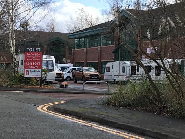 Travellers outside the Warrington Guardians offices