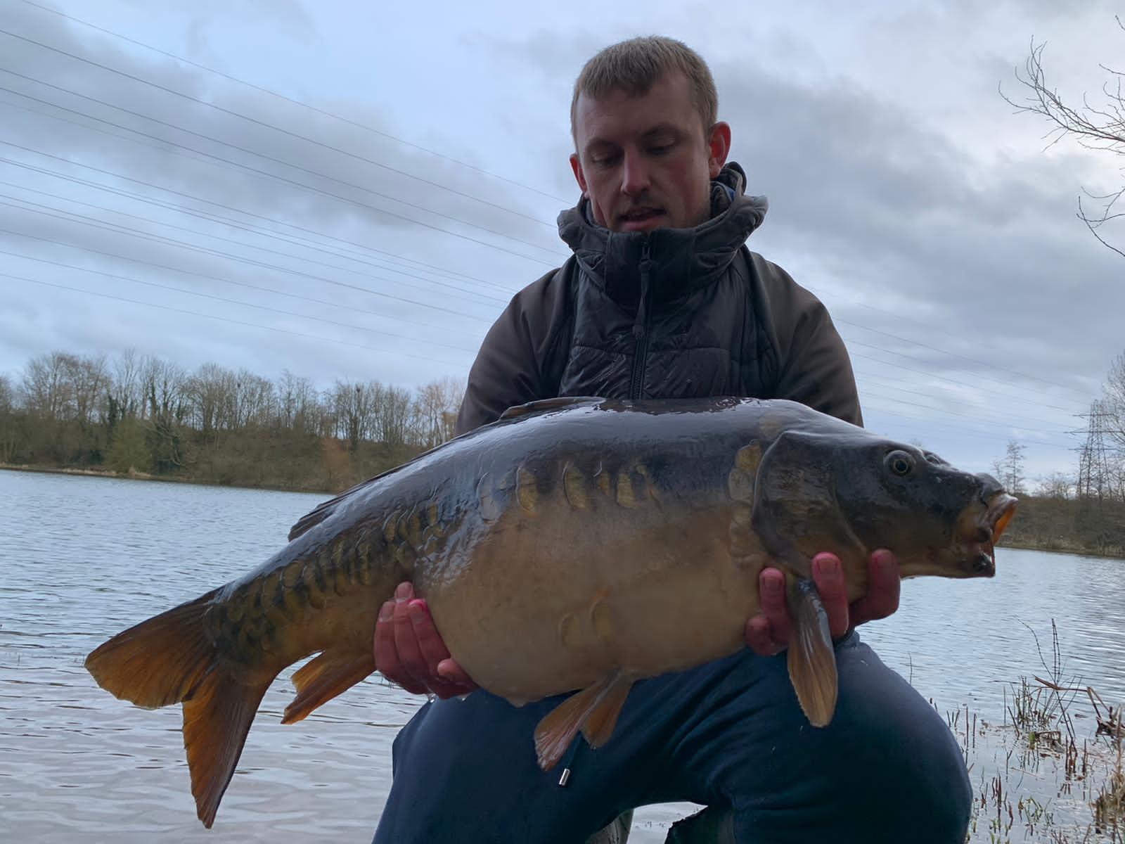 Jack Webb with the 25lb mirror carp he caught at Grey Mist Mere