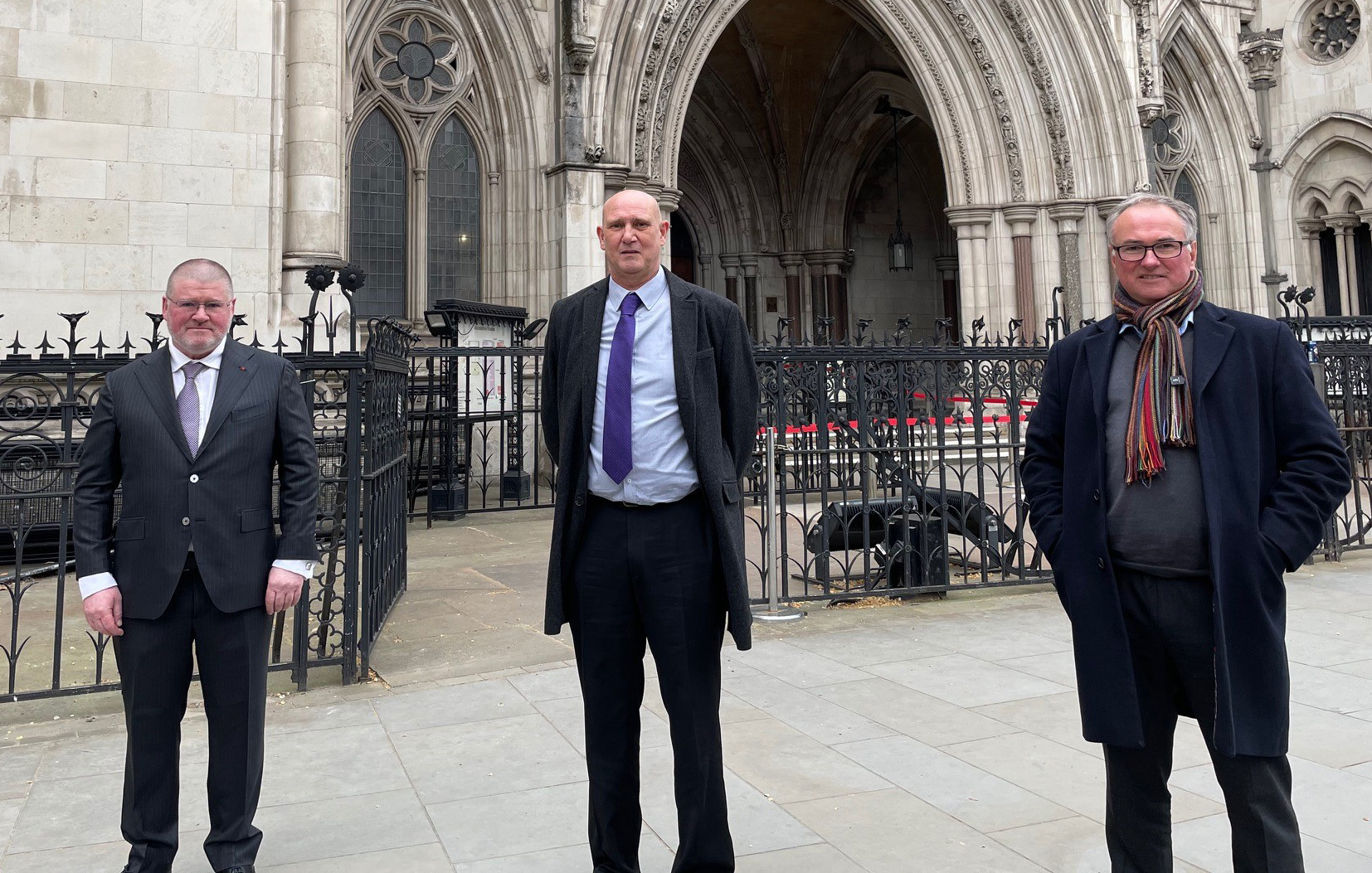 Andrew Green, with his barrister James Couser (left) and solicitor Peter Coyle (right), outside the Royal Courts of Justice in London after he won a High Court fight against Betfreds refusal to pay a £1.7 million jackpot he won in an online