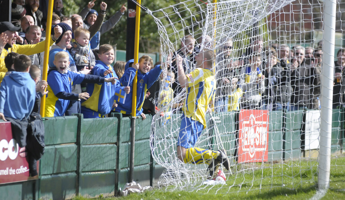 Chris Gahgan celebrates his goal in the promotion-clinching win. Picture by Mike Boden