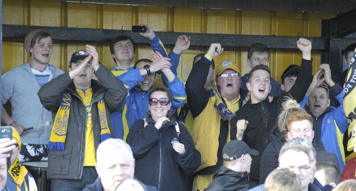 Yellows supporters celebrate the title win. Picture by Mike Boden