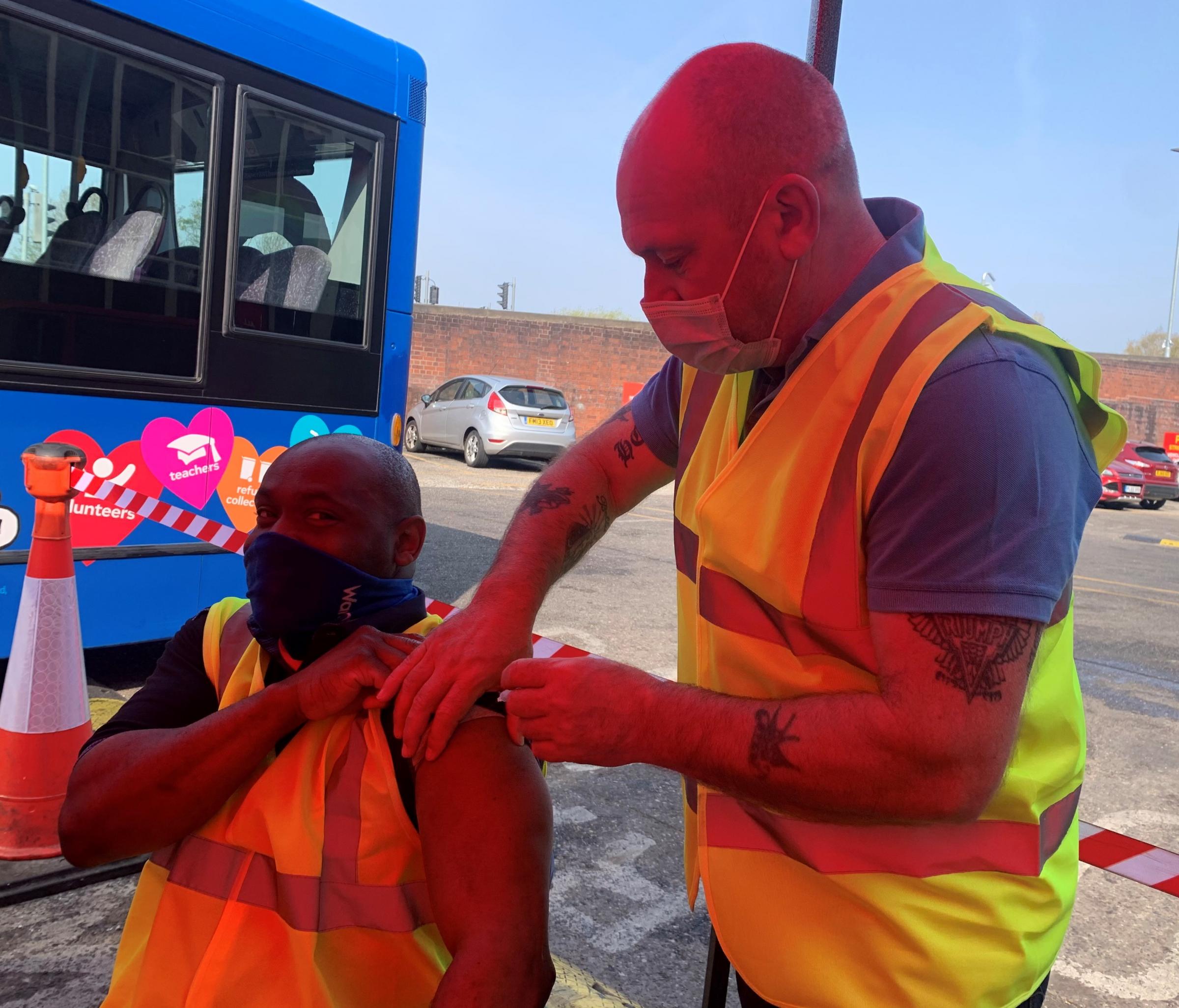 Warringtons Own Buses staff receive their vaccines by the vaccination bus team