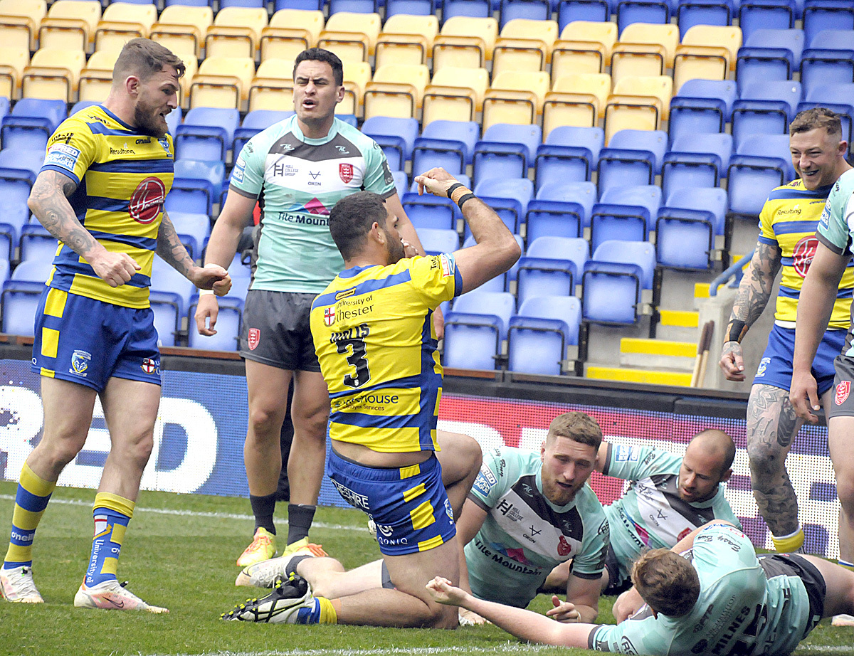 Greg Inglis celebrates scoring on his Warrington Wolves debut against Hull KR in May. Picture by Mike Boden