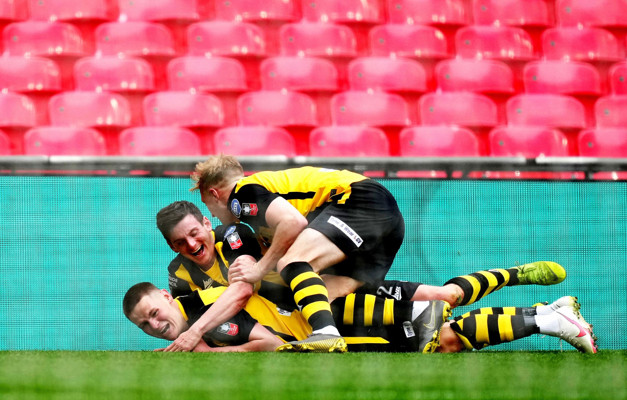 The celebrations that followed Oliver Martins FA Vase-winning goal for Hebburn Town. Picture by John Walton/PA Wire