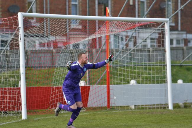 Graeme McCall celebrates saving the crucial penalty at Shildon. Picture by Mark Percy