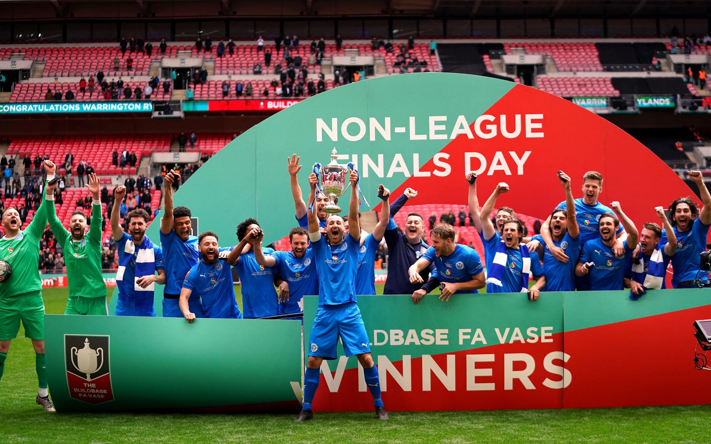 Warrington Rylands lift the FA Vase at Wembley Stadium after beating Binfield in the final in May. Picture by PA Wire