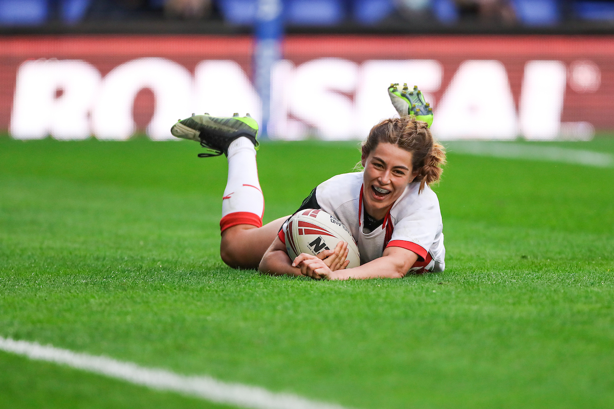 Emily Rudge scores a try for England against Wales. Picture by SWPix.com