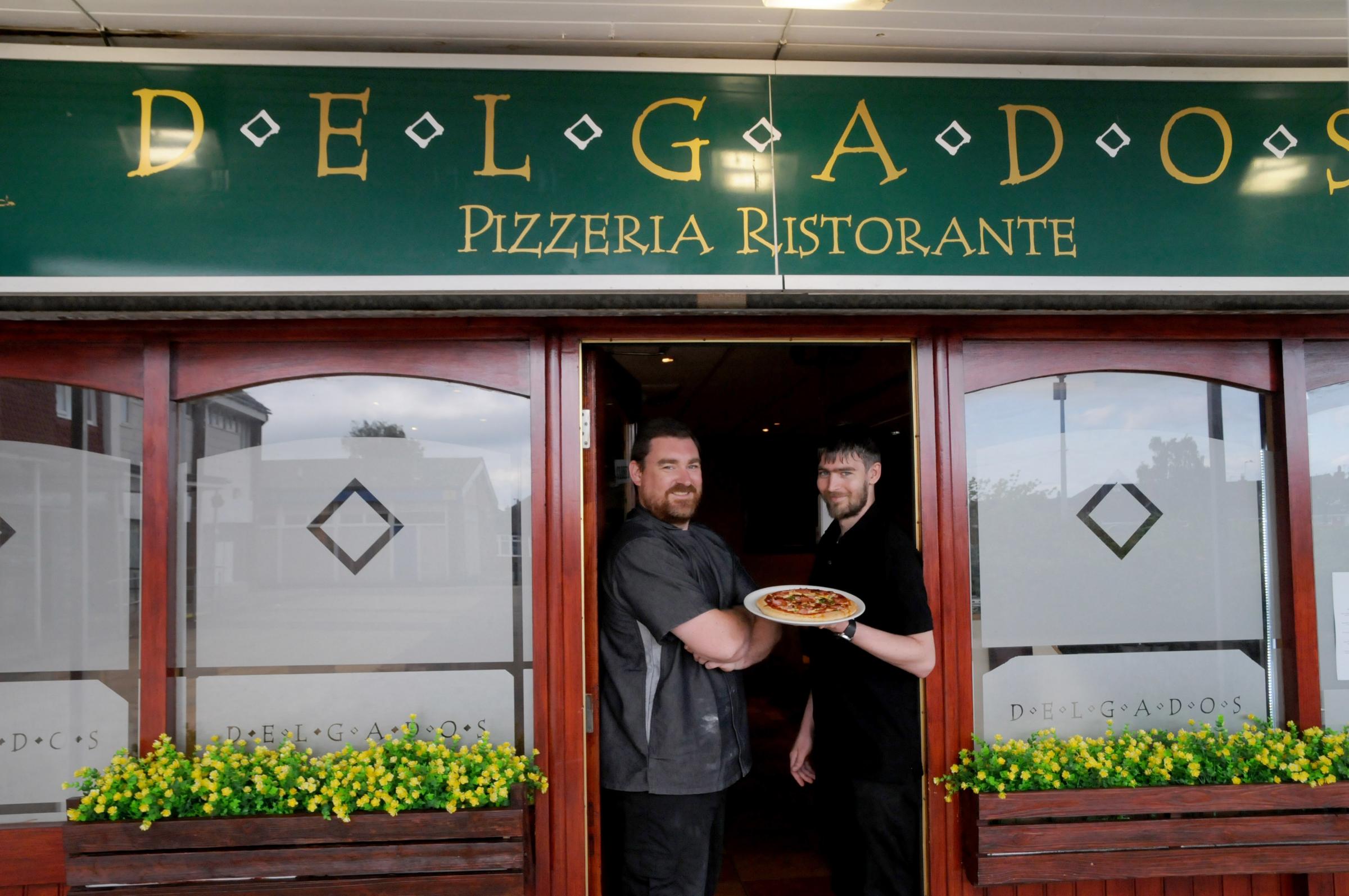 Andy Stafford manager and chef at Delgados with front of house worker Jack Taylor