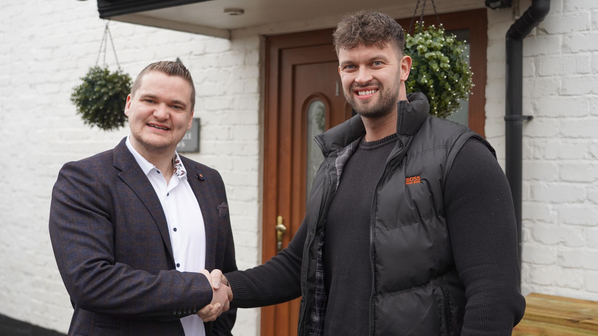 Lawton (right) pictured on his life-changing Financial Freedom Challenge with his property guru, Samuel Leeds