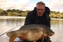 Phil Brown with the 21lb mirror carp he caught at Appleton Reservoir