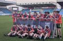 Great Sankey Year 11 rugby league team celebrate winning the national final at Featherstone Rovers' ground