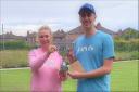 Donna and Kyle Chapman with the Festival Mixed Pairs trophy