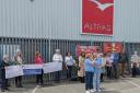 A protest took place outside Altrad in Appleton Thorn, with campaigners demanding £10million from the company