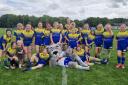 Warrington Girls under 11s rugby league team with Wolfie