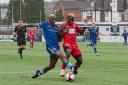Adamah Sidibeh takes on a Macclesfield defender during Rylands' FA Cup defeat to the Silkmen on Saturday