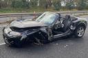 A black Mazda collided with the central reservation on the M56 eastbound, causing hours of closures - no serious injuries were reported