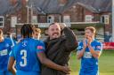 Michael Clegg celebrates the win over Hyde United with his players