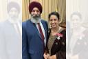 Kuldeep Dhillon and his wife Balbir Kaur, of Locking Stumps, after receiving their BEM honours