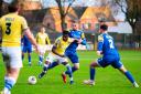 Isaac Buckley-Ricketts is surrounded by King's Lynn defenders during Saturday's goalless draw at The Walks
