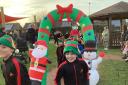 Pupils at St Peter's in Woolston took part in a sponsored 'Elf Run' to raise money for St Rocco's Hospice
