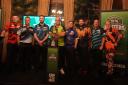 The eight PDC superstars taking part in the Dutch Darts Masters, including Warrington's Luke Littler fourth from right