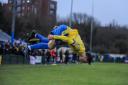 Connor Woods somersaults in celebration of his goal against Chorley