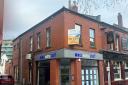 Town centre building home to business and flats with planning permission is for sale